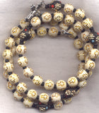 Cross Beads white with gold crosses spring wire rosary bracelet BR016
