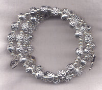 Silver Rosebud spring wire rosary bracelet BR008