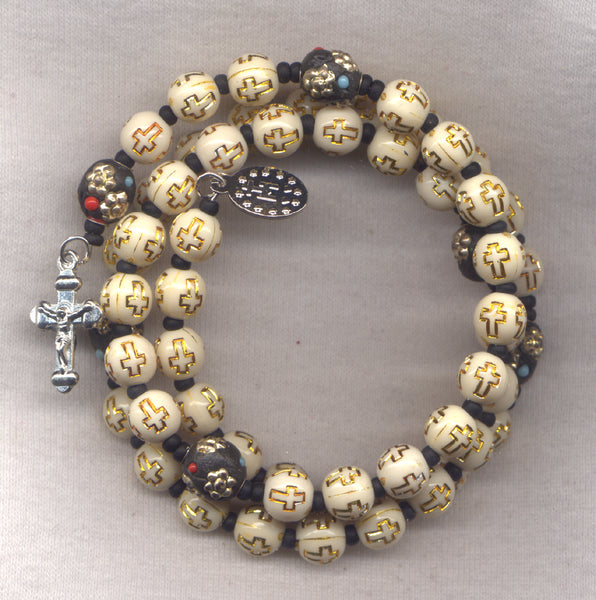 Cross Beads white with gold crosses spring wire rosary bracelet BR016